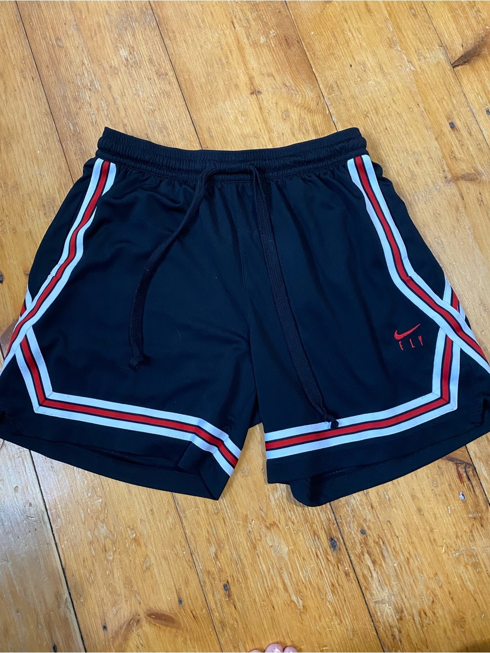 Nike womens Black Athletic Shorts with Red & White Stripe good condition size L